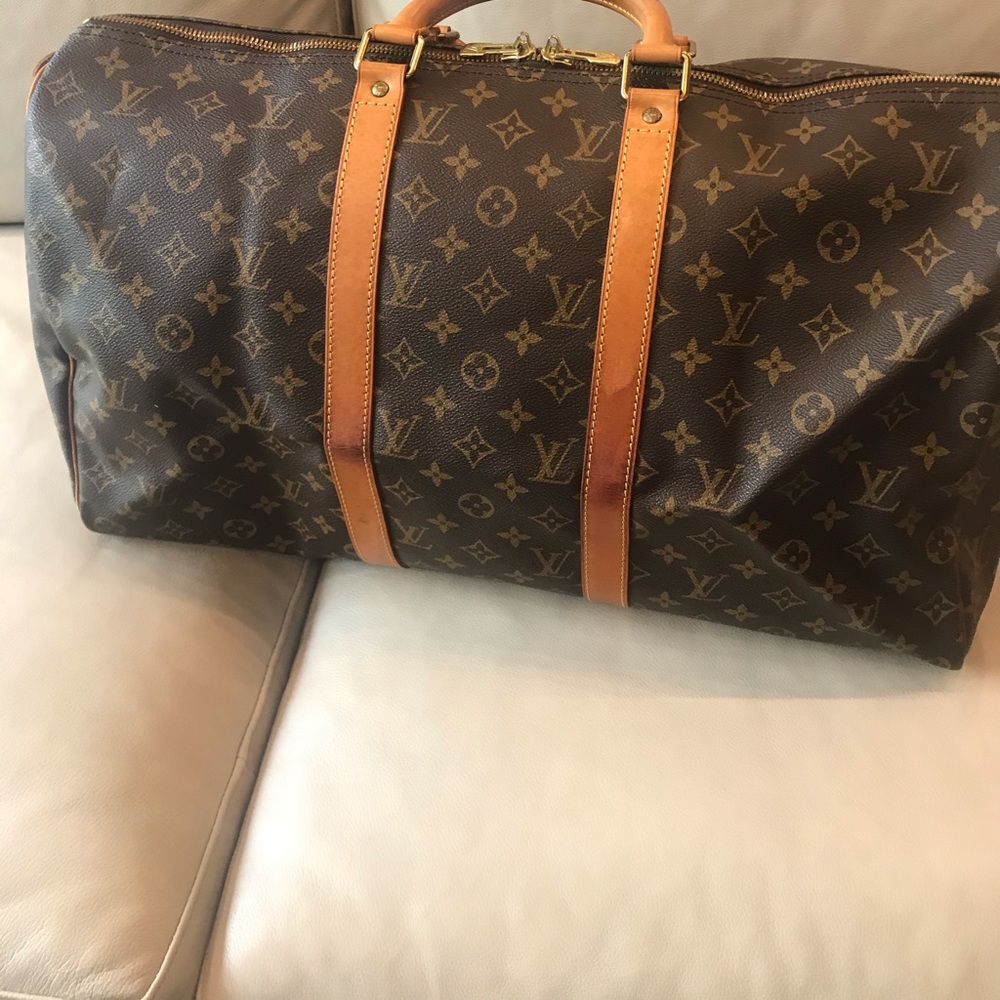 Louis Vuitton Monogram Keepall 50 duffel bag.